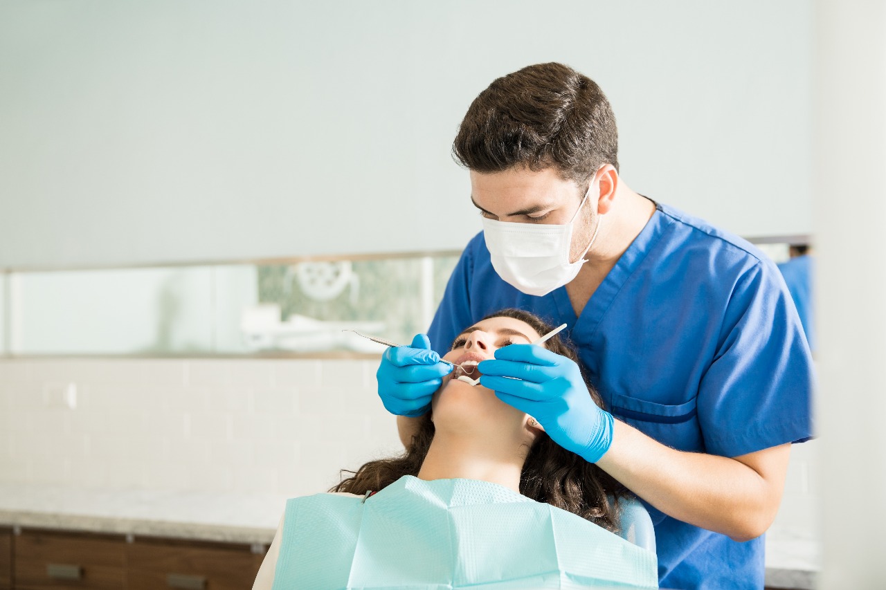 Dentist with patient